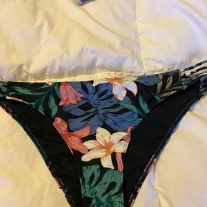 Hollister, size Large, black with Hawaiian print flower bikini bottoms.